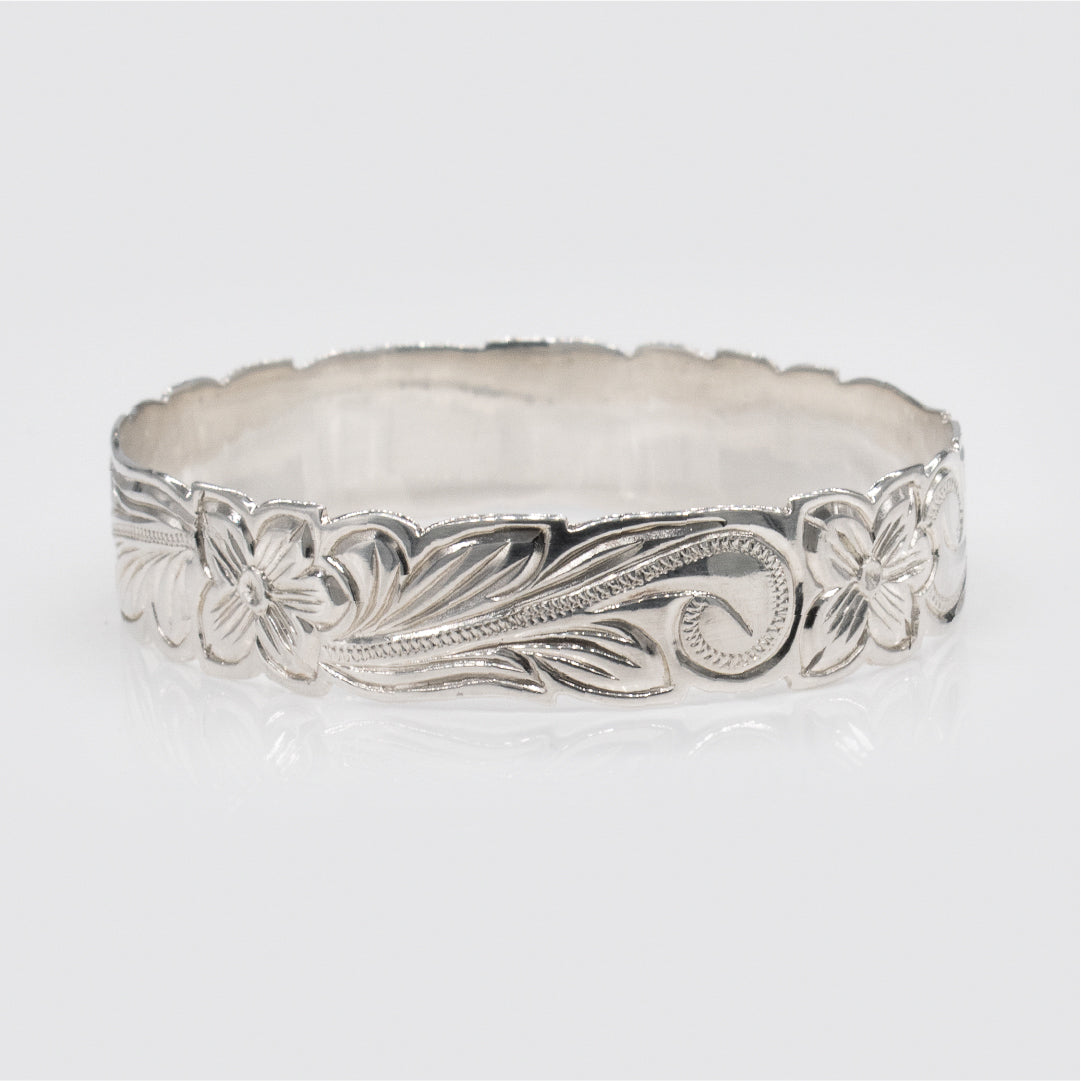 Sterling Silver 15mm Plumeria & Scroll Cut-Out Isla Bangle