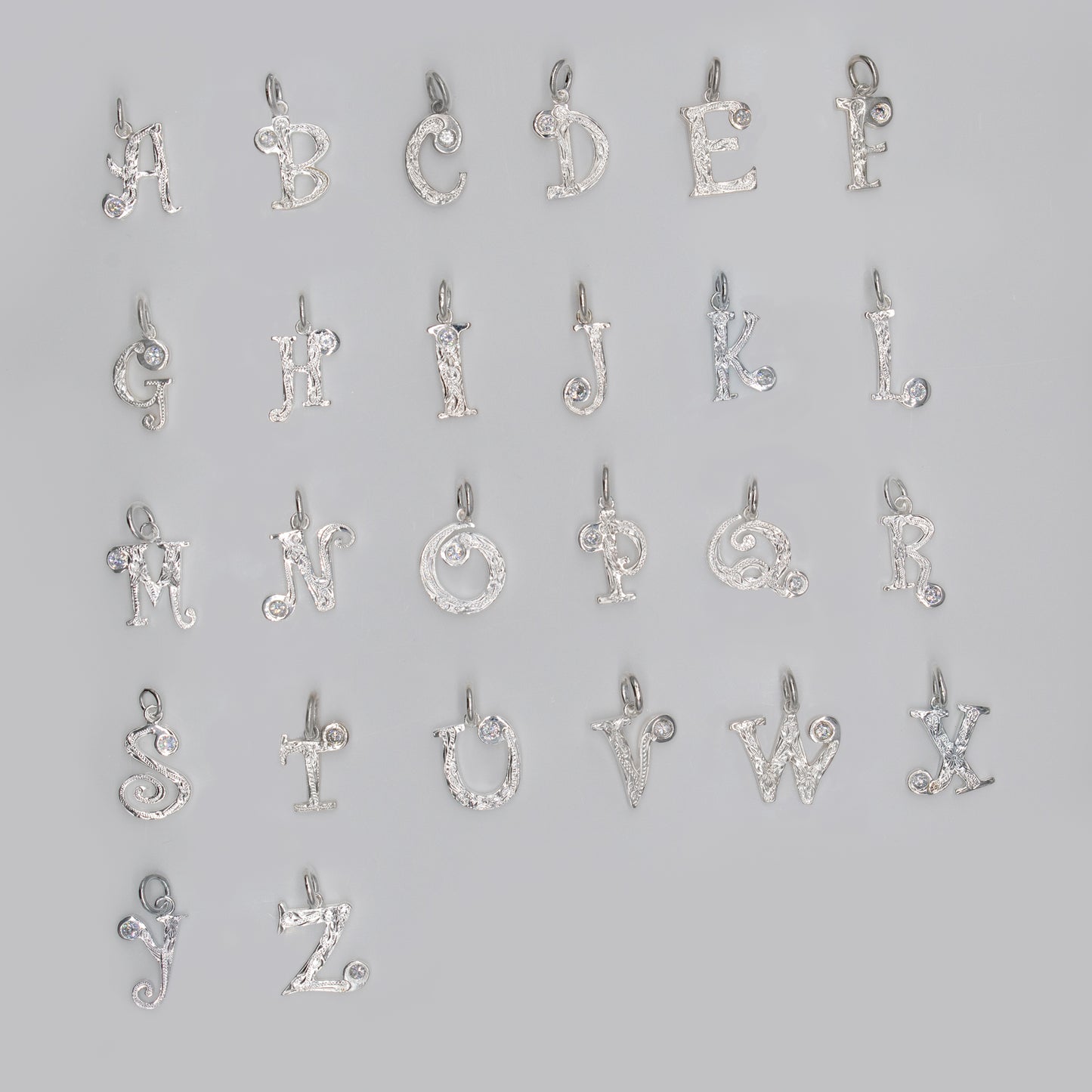 Sterling Silver Plumeria Tasi Initial Necklace A-Z