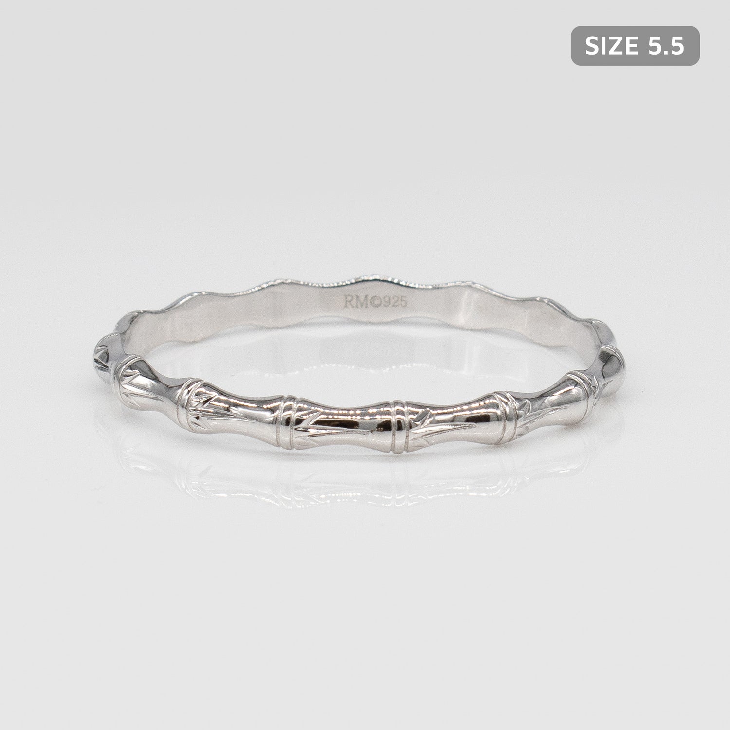 Kids Sterling Silver and Rhodium Bamboo Design Rosa Bangle. Size 5.5.