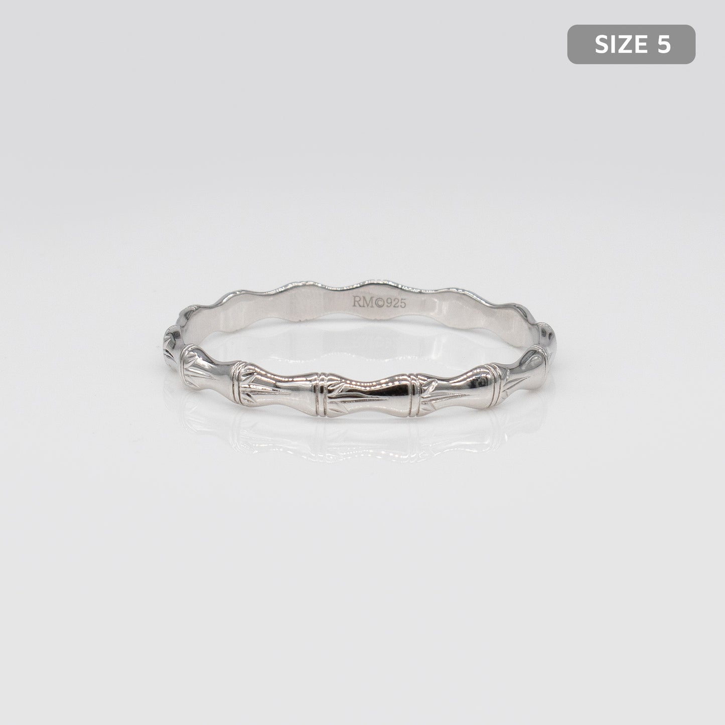 Kids Sterling Silver and Rhodium Bamboo Design Rosa Bangle. Size 5.